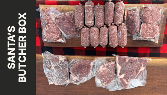 Assorted packaged meats on a wooden board with a red checkered tablecloth background, featuring 'Santa's Butcher Box' branding.