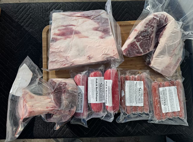 Packaged raw meat on a cutting board with visible labels.